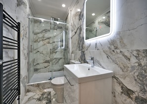 Hair dryer, towels, soap, toilet paper