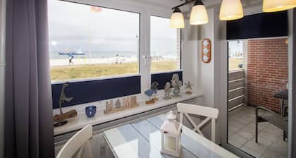 Modern apartment with balcony in a central location with a view of the east beach!