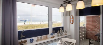 Modern apartment with balcony in a central location with a view of the east beach!