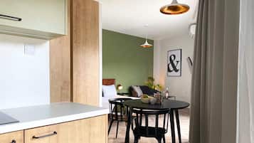 Classic Apartment, Balcony | Private kitchen | Electric kettle, highchair