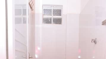 Shower, free toiletries, slippers, towels