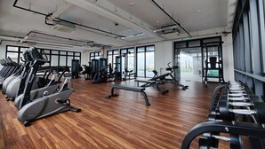 A gym with treadmills, weight machines, and benches. - The Grand Subang Jaya SS15 By Emily in Town (Subang Jaya)