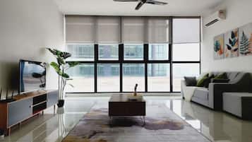 Superior Apartment, 2 Bedrooms, Balcony, City View | Living area | 35-inch TV with cable channels