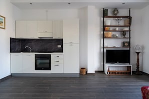 Comfort Apartment, Garden View | Private kitchen | Fridge, stovetop, electric kettle, cookware/dishes/utensils - Penthouses with Terrace by Wonderful Italy (Bari)