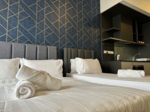 Deluxe Studio, 2 Queen Beds, Balcony, City View | Desk, free WiFi