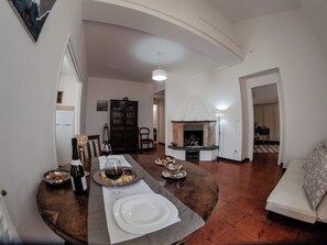 Family Apartment, Balcony, City View | Living area | 32-inch Smart TV with satellite channels