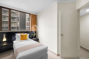 Apartment, 3 Bedrooms, Balcony | Desk, laptop workspace, iron/ironing board, free WiFi