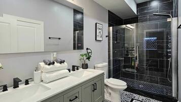 Shower, hair dryer, towels, soap
