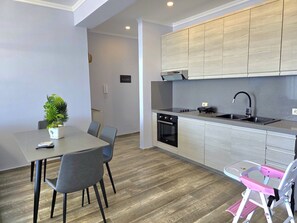 Fridge, oven, electric kettle, toaster
