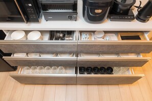 Fridge, microwave, stovetop, cookware/dishes/utensils