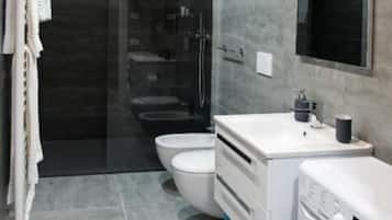 Apartment, 1 Bedroom | Bathroom | Shower, free toiletries, hair dryer, bidet
