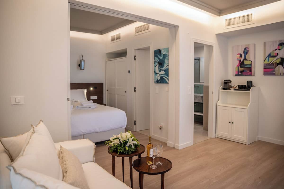 Junior Suite, Balcony, Garden View | Hypo-allergenic bedding, in-room safe, iron/ironing board, free WiFi