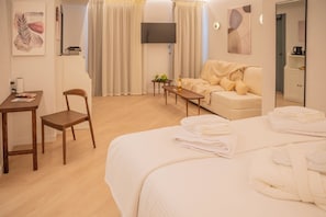 Luxury Suite, Balcony, Garden View | Hypo-allergenic bedding, in-room safe, iron/ironing board, free WiFi