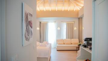 Superior Suite, Balcony, Sea View | Hypo-allergenic bedding, in-room safe, soundproofing, iron/ironing board