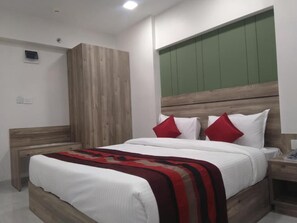 Suite, City View | Premium bedding, desk, laptop workspace, rollaway beds - Hotel Indus Inn (Rajgurunagar)