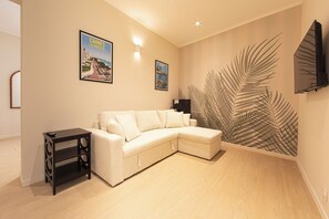 Presidential Studio Suite | Living area | 100-cm Smart TV with digital channels
