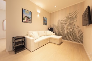 Presidential Studio Suite | Living area | 100-cm Smart TV with digital channels