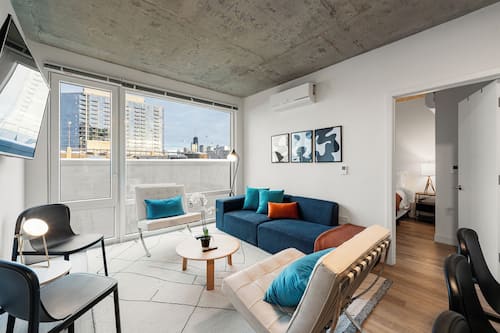Superior Apartment, City View | Living area | 75-inch Smart TV with digital channels, Netflix, streaming services