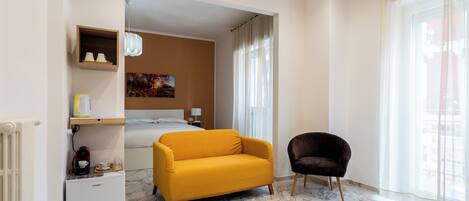 Classic Room, City View | Living area | 30-inch TV with satellite channels