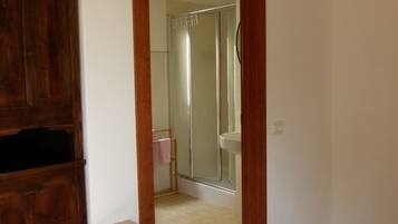 Apartment, Hill View | Living area | 32-inch TV with cable channels