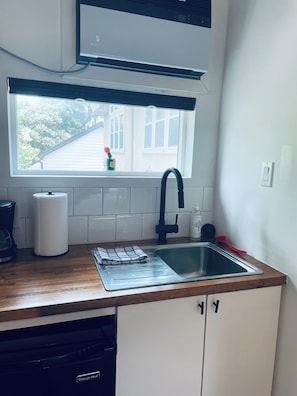 Fridge, microwave, stovetop, coffee/tea maker