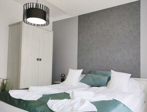 3 slaapkamers, een strijkplank/strijkijzer, wifi, beddengoed