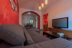 Apartment, 2 Bedrooms, Balcony | Living area | 30-inch TV with satellite channels - Crocetta Charme & Colour by Wonderful Italy (Turin)