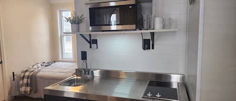 Fridge, microwave, stovetop, coffee/tea maker
