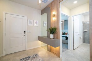 Shower, hair dryer, towels, shampoo