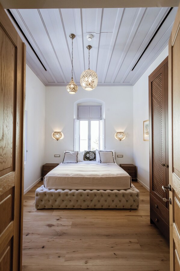 1 chambre, coffre-fort, fer et planche à repasser