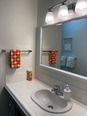 Hair dryer, towels, soap, toilet paper