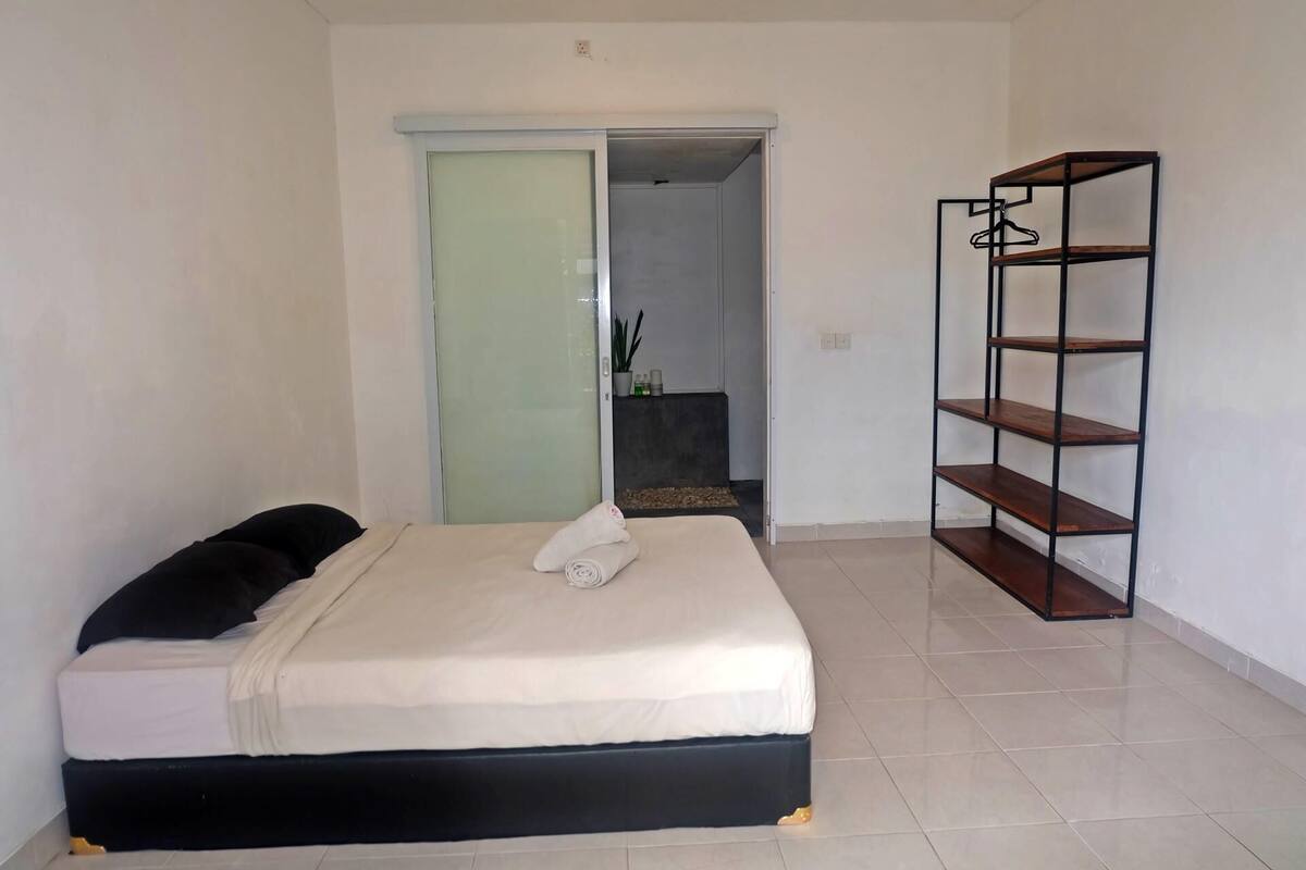 Basic Studio, Pool View | In-room safe, desk, laptop workspace, blackout drapes