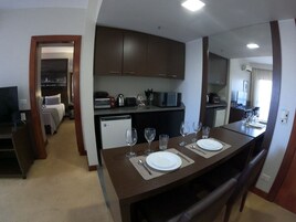 Fridge, microwave, cookware/dishes/utensils