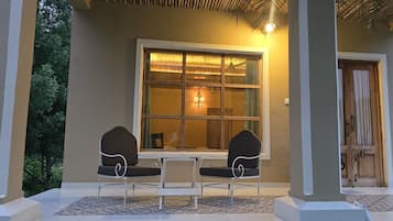 Luxury Suite, Garden View | Terrace/patio
