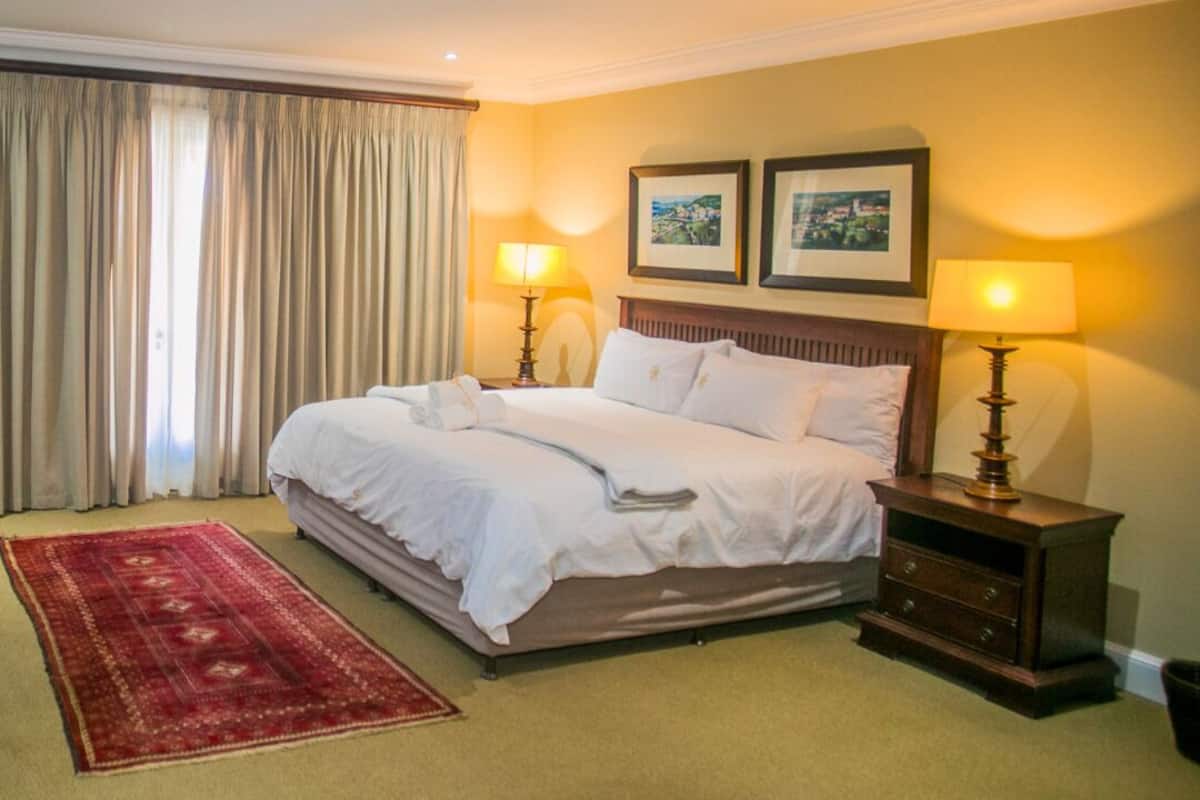 Desk, laptop workspace, blackout curtains, free WiFi
