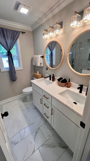 Shower, hair dryer, towels, soap