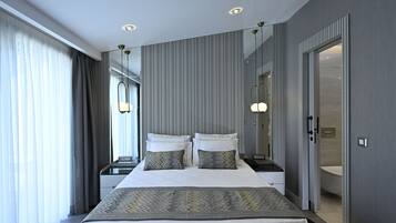 Elite-sviitti, kaupunkinäköala | Ylelliset vuodevaatteet, Select Comfort -patjalliset sängyt