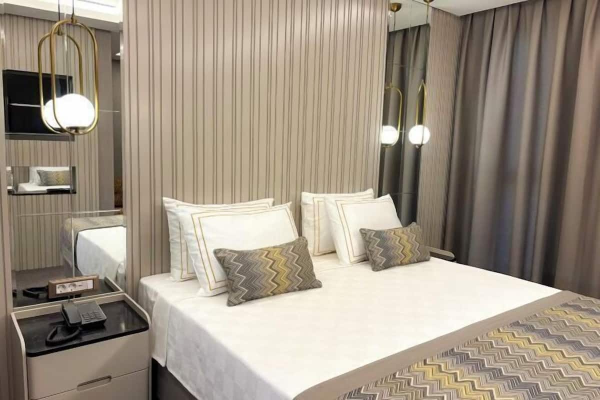 Premium bedding, free minibar items, in-room safe, blackout curtains