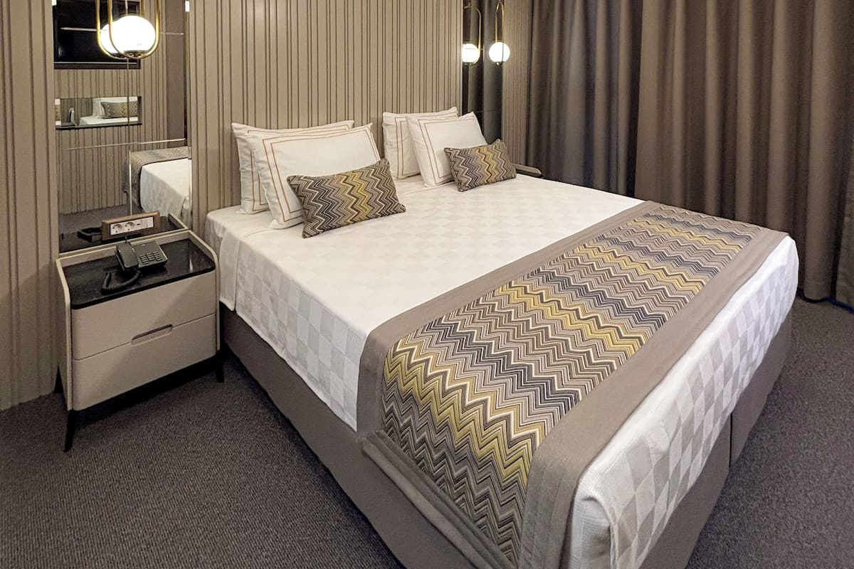 Superior Quadruple Room, City View | Premium bedding, free minibar items, in-room safe, blackout curtains