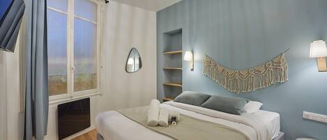 1 bedroom, laptop workspace, iron/ironing board, bed sheets