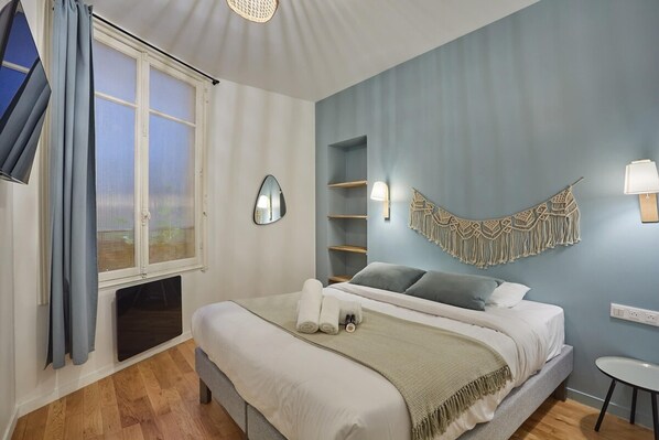 1 bedroom, laptop workspace, iron/ironing board, bed sheets