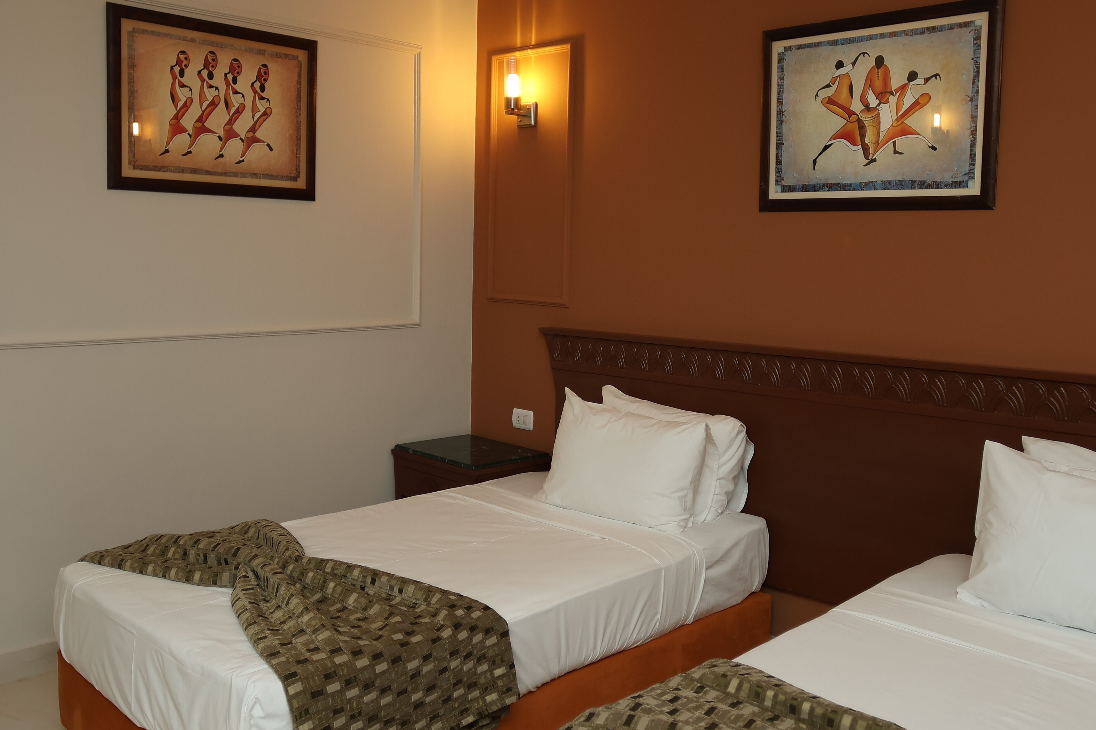 Chambre Triple Standard | Coffres-forts dans les chambres, rideaux occultants