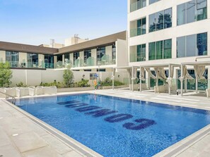 Pool - Bright & New 1BR in JVCwith pool and gym (Dubai)