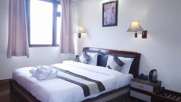 Standard Double Room, Balcony, Hill View | In-room safe, desk, laptop workspace, blackout drapes