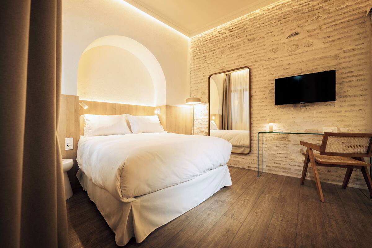 Carmen - Andalusian Patio Economy Double Room | In-room safe, desk, laptop workspace, blackout drapes