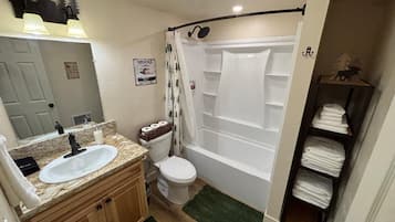 Hair dryer, towels, soap, shampoo