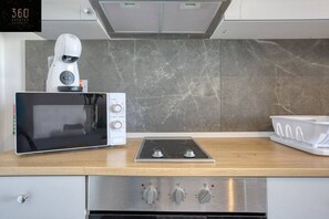 Fridge, microwave, dishwasher, coffee/tea maker