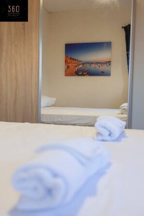 Desk, iron/ironing board, travel crib, free WiFi