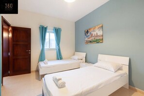 Desk, iron/ironing board, travel crib, free WiFi
