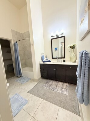 Hair dryer, towels, soap, shampoo